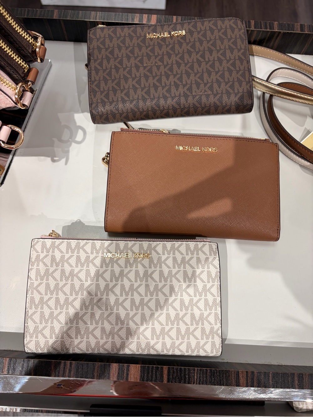 Michael Kors Brown, Tan & Cream Trio Zip Wallets Set
